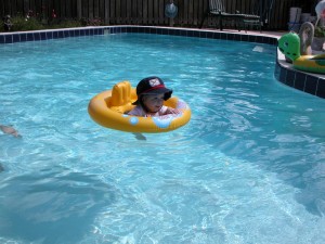 Gavin in the pool Gavin in his float